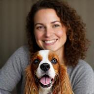 Emily Ross with a smiling spaniel